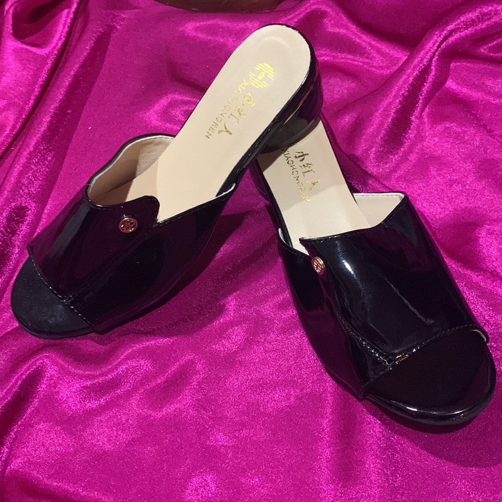 Swanky black plover heels. Slide on. Size 39.  NWOT. Shiny